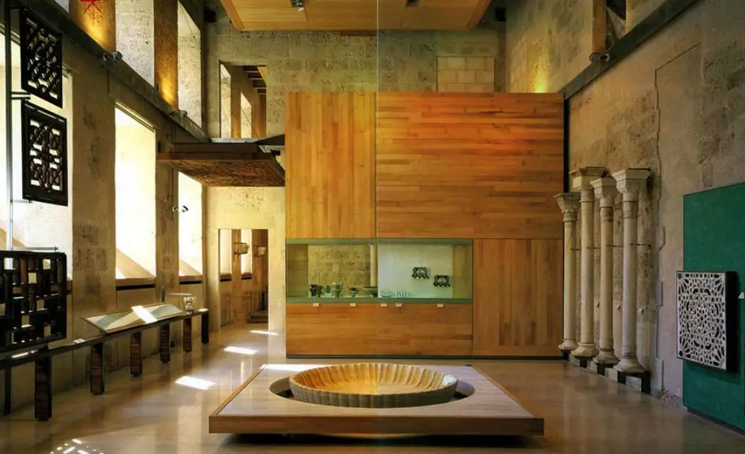 Religious paintings and sculptures inside the Fine Arts Museum at the Palace of Charles V
