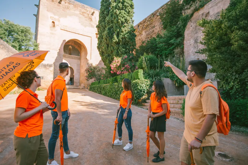 The Guide explaining the Gate of Justice to the tourists