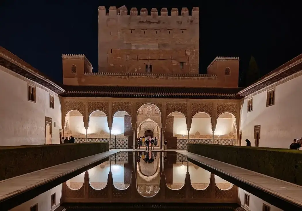 The Comares Palace illuminated at night