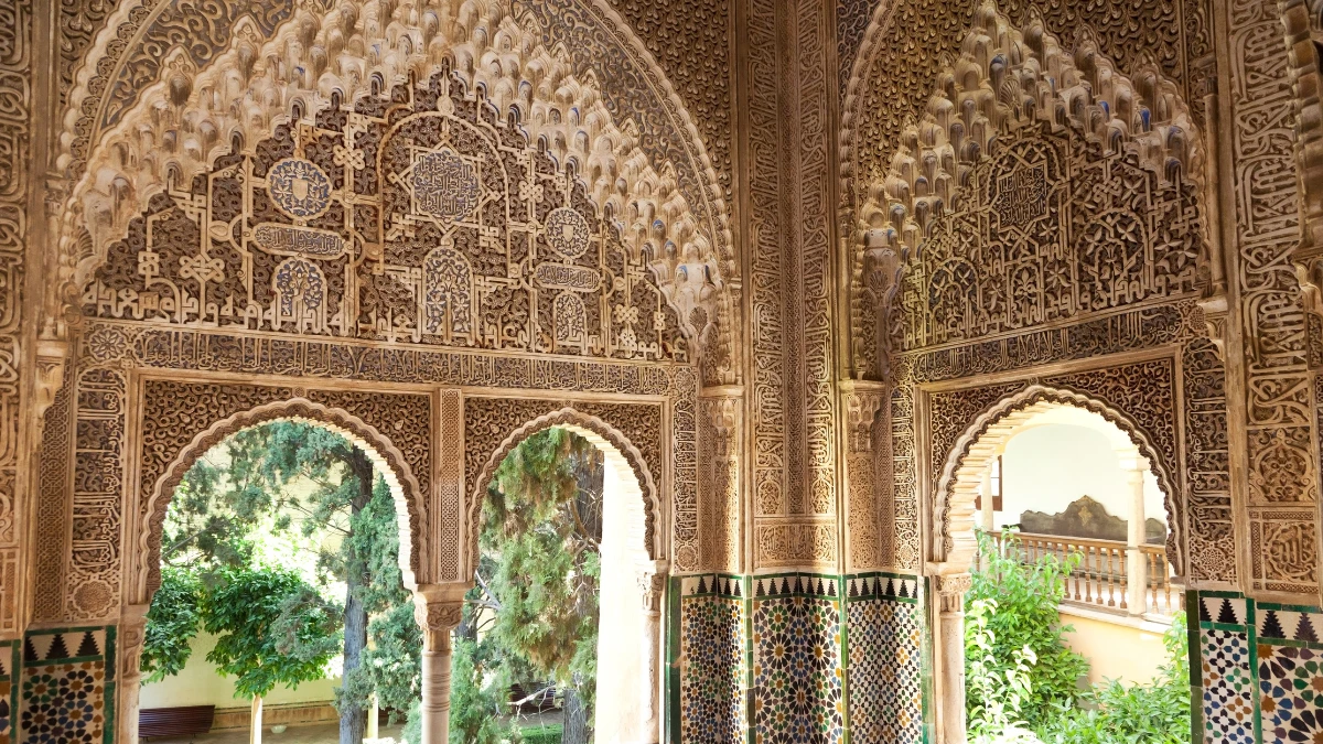 The intricate Arabic design on the Nasrid palaces' walls