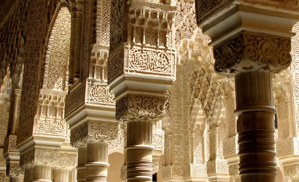 Inscriptions written on the pillars inside the Nasrid Palaces