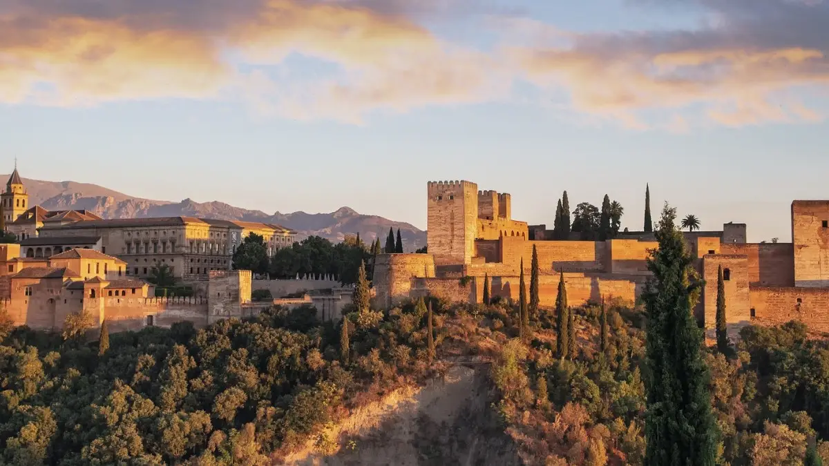 A full view of Alhambra Castle surrounded by the Alhambra forest