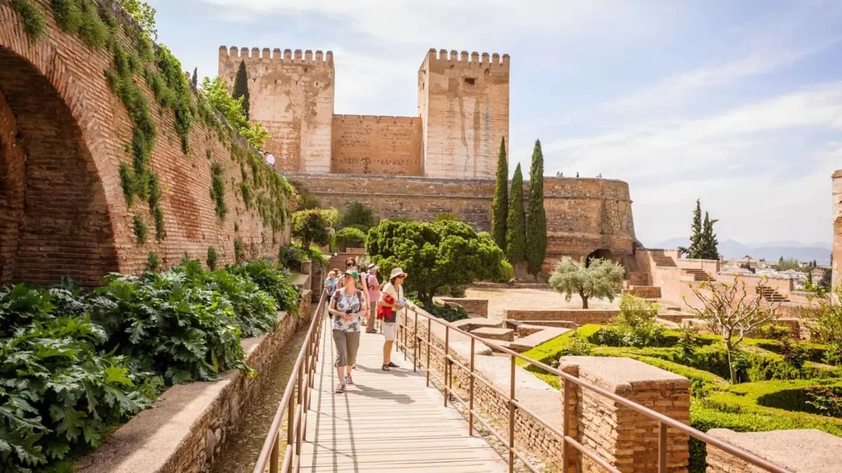 Tourists visiting Alhambra on a private tour Tourists visiting Alhambra on a private tour
