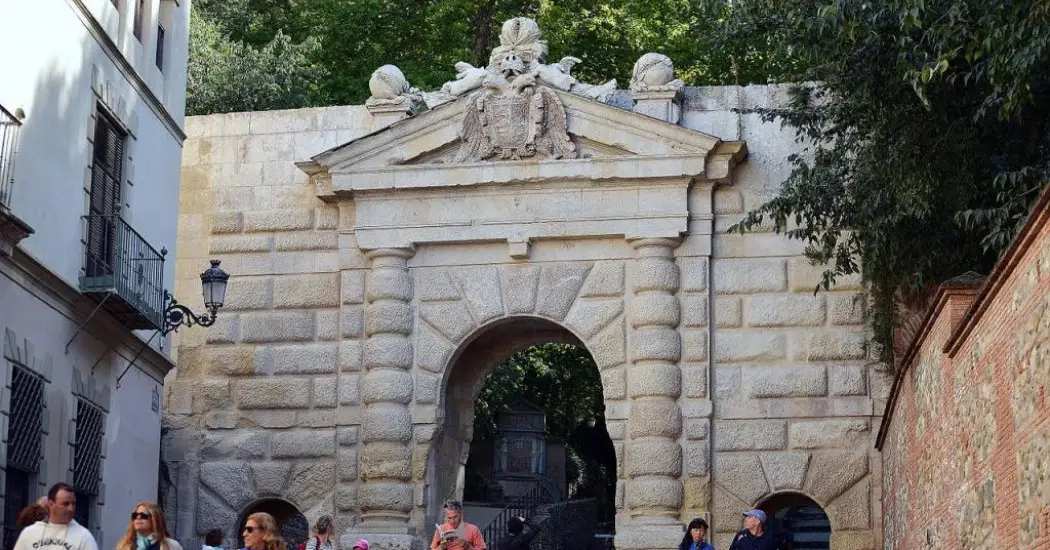 Tourists visiting the Gate of Pomegranates Tourists visiting the Gate of Pomegranates